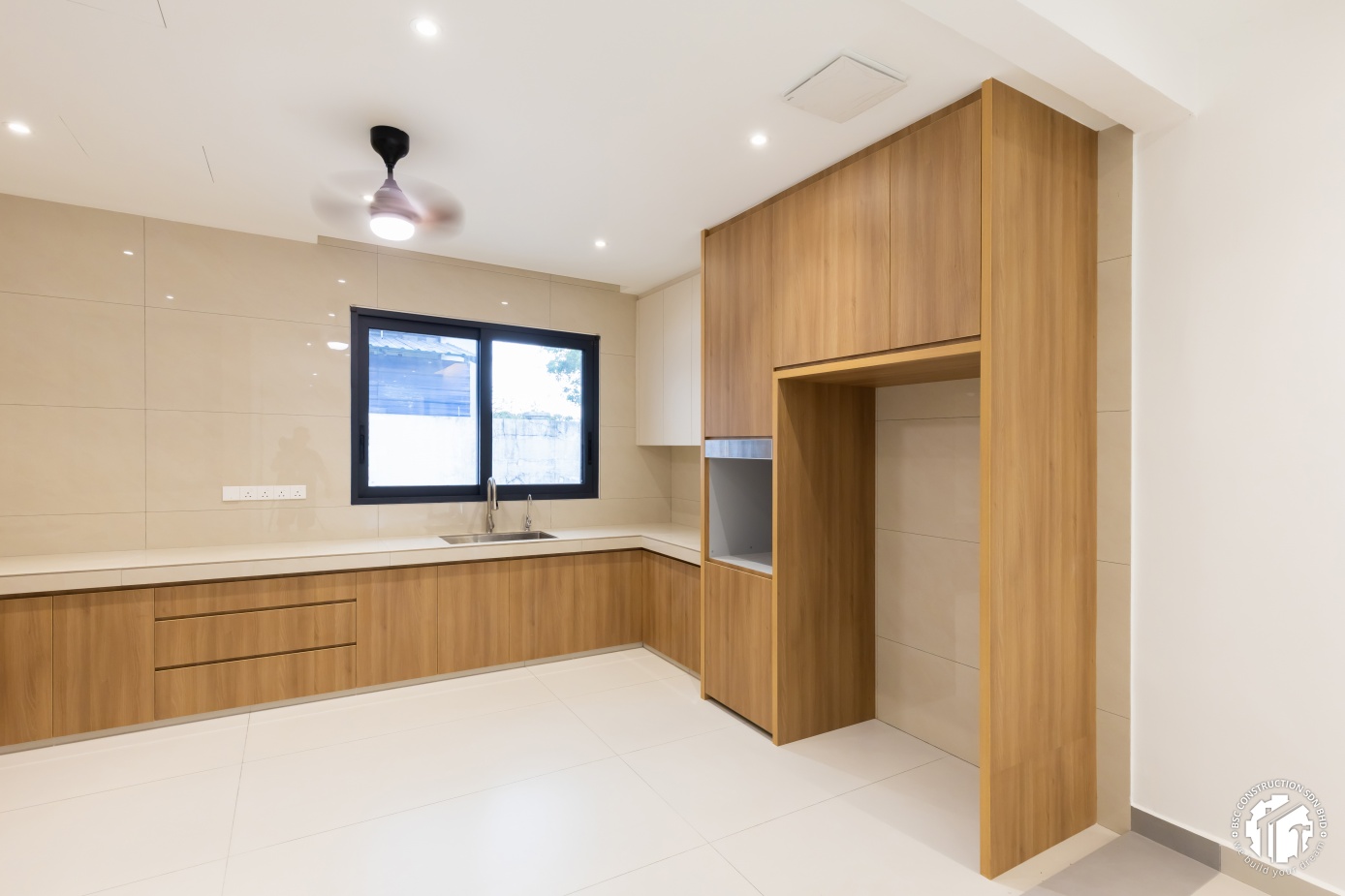 Modern L-shaped kitchen with wood-tone cabinetry